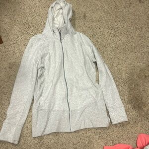 This is a lululemon zip up, size 14, and it’s grey